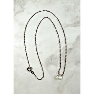 Small Faceted Clear Teardrop Crystal on a Gold Tone Necklace - 16"